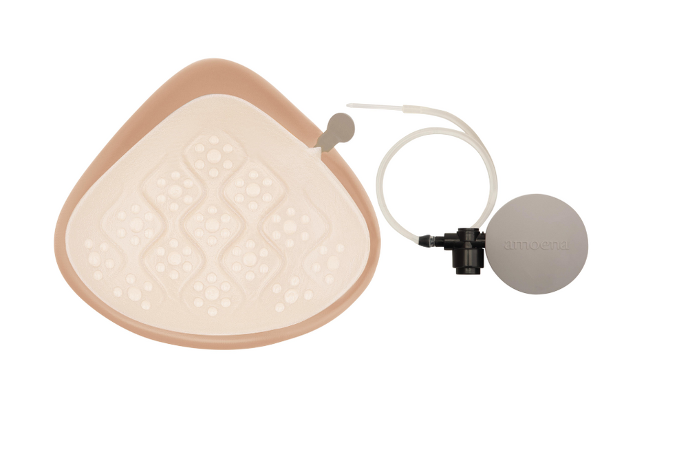 
                      
                        Back of Amoena 2SN Adapt Air Light Breast Form. Includes pump 
                      
                    